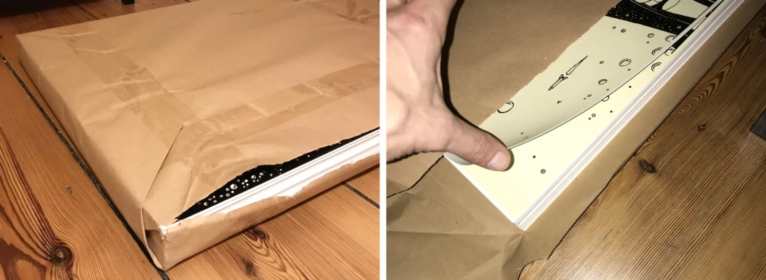 Teilweise geöffnetes Posterpaket im Lager von Fiete Rakete