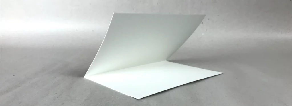 Geöffnete Weihnachtskarte 2025, weiße Innenseite, beschreibbare Fläche.